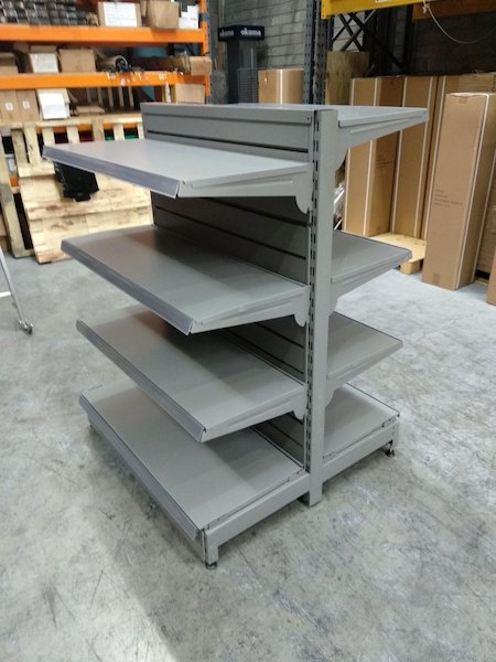 Double Sided grey shop shelving , 1350mm high. With slatwall
